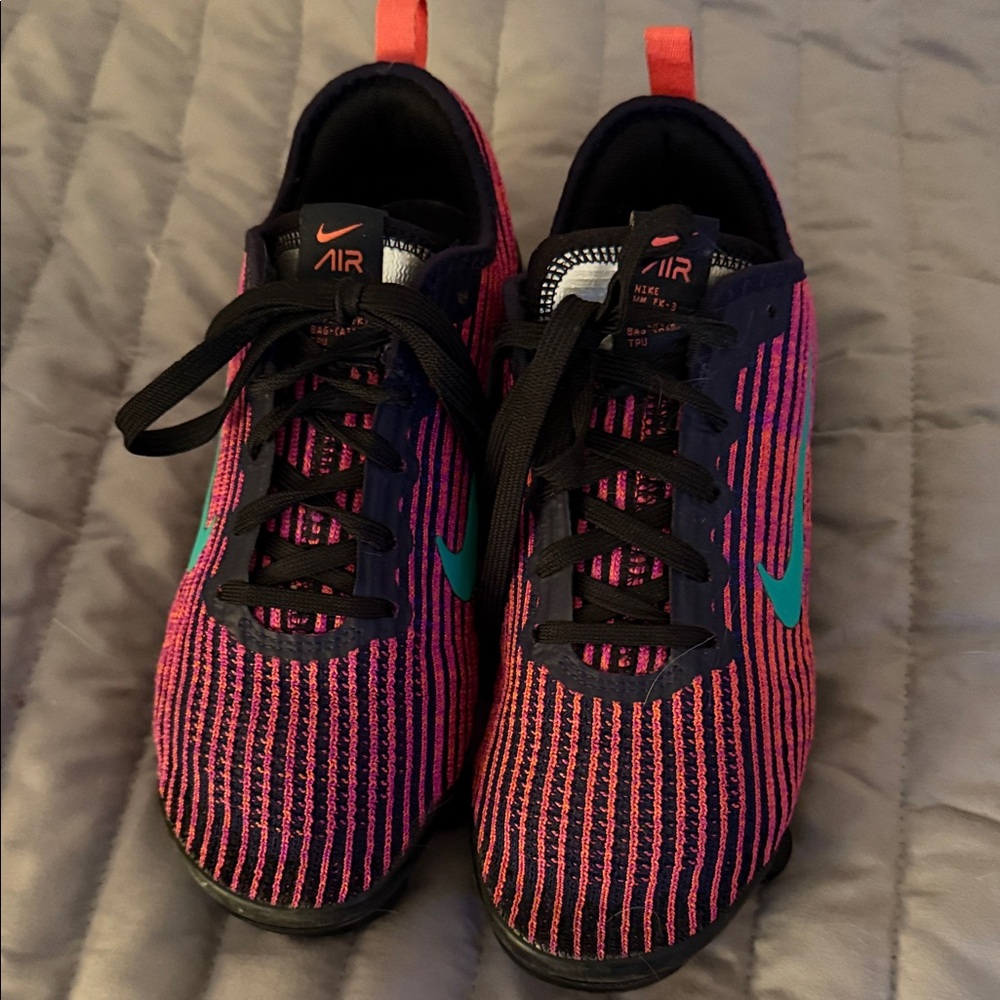 Nike Air Black and Pink Striped Sneakers
